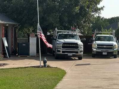 Wheelhouse service vans at a Dallas job site